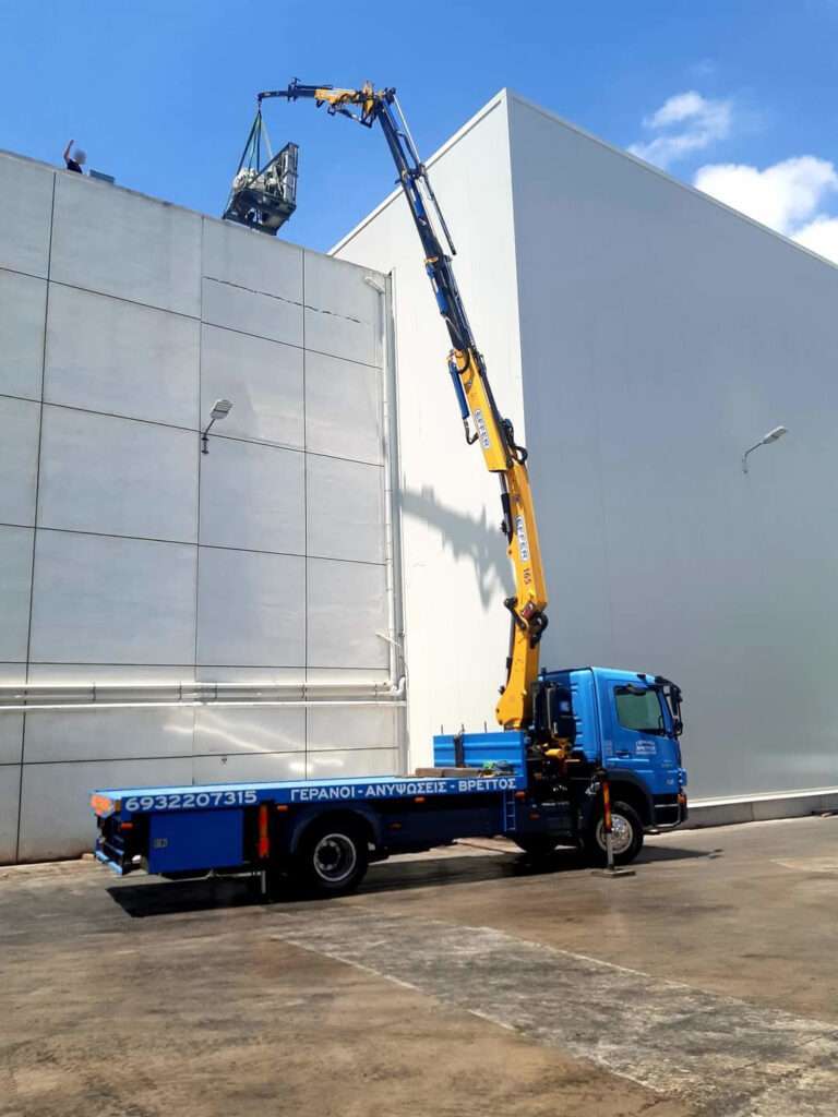 Ανύψωση μηχανολογικού εξοπλισμού σε ταράτσα βιομηχανικού κτιρίου - Βρεττός Γερανοί Αθήνα