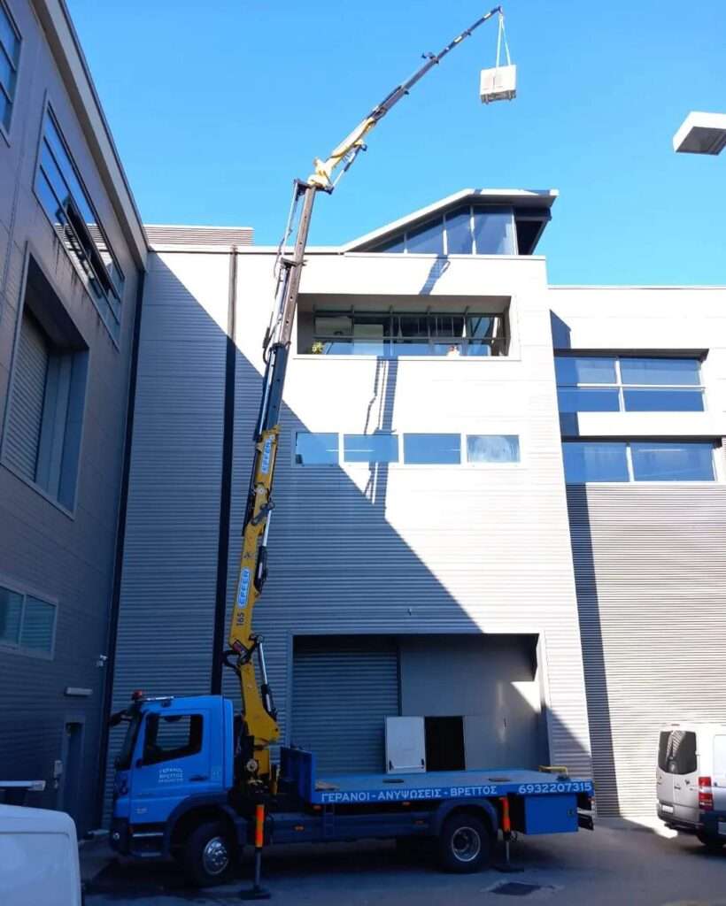 Ανύψωση φορτίων σε βιομηχανικά κτίρια και γραφεία με γερανό - Βρεττός Γερανοί Αττική